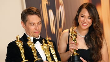 Director Sean Baker holds the Oscars for Best Picture, Best Director, Best Film Editing and Best Original Screenplay for "Anora" as producer Samantha Quan poses with the Oscar for Best Picture for "Anora" in the Oscars photo room at the 97th Academy Awards in Hollywood, Los Angeles, California, U.S., March 2, 2025. REUTERS/Daniel Cole