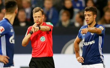 Referee Markus Schmidt awards a penalty for Schalke during the German Bundesliga soccer match against VfL Wolfsburg.