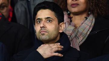 (FILES) In this file photo taken on March 6, 2018 Paris Saint-Germain's Qatari president Nasser Al-Khelaifi reacts during the UEFA Champions League round of 16 second leg football match between Paris Saint-Germain (PSG) and Real Madrid at the Parc de