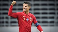 Cristiano Ronaldo celebrates scoring his 100th goal for Portugal. 