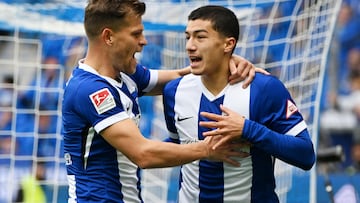 26 October 2024, Baden-Württemberg, Karlsruhe: Soccer: Bundesliga 2, Karlsruher SC - Hertha BSC, Matchday 10, BBBank Wildpark. Berlin's Florian Niederlechner (l) and Ibrahim Maza celebrate the goal for 0:1 by Ibrahim Maza. Photo: Uli Deck/dpa - IMPORTANT NOTE: In accordance with the regulations of the DFL German Football League and the DFB German Football Association, it is prohibited to utilize or have utilized photographs taken in the stadium and/or of the match in the form of sequential images and/or video-like photo series. (Photo by Uli Deck/picture alliance via Getty Images)