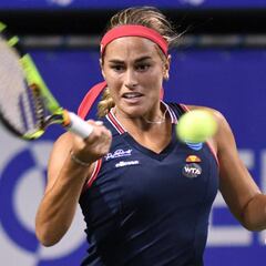 Monica Puig back to winning ways in rainy Tokyo