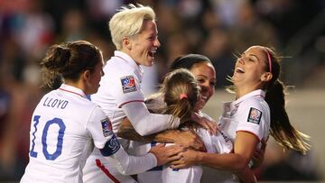 Oct 17, 2014; Bridgeview, IL, USA; USA player Tobin Heath (17) is congratulated by teammates after scoring a goal against Guatemala during a women&#039;s World Cup qualifier soccer match at Toyota Park. Mandatory Credit: Jerry Lai-USA TODAY Sports