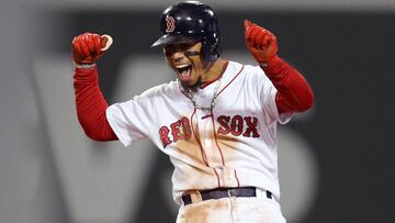 BOSTON, MA - OCTOBER 14: Mookie Betts #50 of the Boston Red Sox celebrates his two-run double during the eighth inning against the Houston Astros in Game Two of the American League Championship Series at Fenway Park on October 14, 2018 in Boston, Massachu