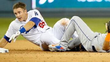 Chase Utley, segunda base de Dodgers, arroll&oacute; a Rub&eacute;n Tejada, en los Playoffs. 
