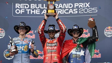 AUSTIN, TEXAS - MARCH 30: (L-R) Alex Marquez of Spain and Gresini Racing MotoGP, Francesco Bagnaia of Italy and Ducati Lenovo Team and Fabio Di Giannantonio of Italy and Pertamina Enduro VR46 Racing Team celebrate on the podium during the MotoGP race during the MotoGP Of USA - Race on March 30, 2025 in Austin, Texas. Mirco Lazzari gp/Getty Images/AFP (Photo by Mirco Lazzari gp / GETTY IMAGES NORTH AMERICA / Getty Images via AFP)