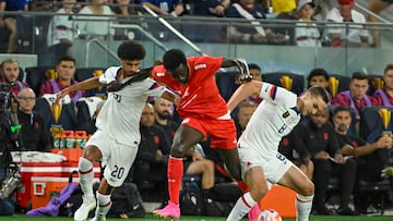 Jun 28, 2023; St. Louis, Missouri, USA; United States defender Jalen Neal (20) and midfielder James Sands (8) defend against Saint Kitts and Nevis forward Keithroy Freeman (16) during the first half at CITYPARK. Mandatory Credit: Jeff Curry-USA TODAY Sports