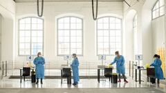 VILANOVA I LA GELTRU, SPAIN - APRIL 15: Health care staff members wait for people to be inoculated with the AstraZeneca COVID-19 vaccine at a vaccination center in the Catalonia Railway Museum on April 15, 2021 in Vilanova i La Geltru, Spain. Spain&#039;s