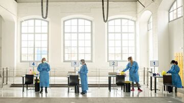 VILANOVA I LA GELTRU, SPAIN - APRIL 15: Health care staff members wait for people to be inoculated with the AstraZeneca COVID-19 vaccine at a vaccination center in the Catalonia Railway Museum on April 15, 2021 in Vilanova i La Geltru, Spain. Spain's