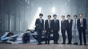 RM, Jin, SUGA, j-hope, Jimin, V y Jung Kook, los integrantes de BTS con el monoplaza de la Fórmula E.