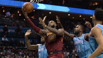 Nov 15, 2017; Charlotte, NC, USA; Cleveland Cavaliers forward LeBron James (23) drives to the basket and scores against Charlotte Hornets forward Michael Kidd-Gilchrist (14) during the first half of the game at the Spectrum Center. Mandatory Credit: Sam Sharpe-USA TODAY Sports