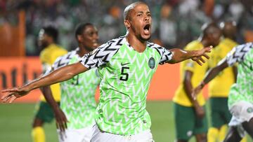 Nigeria&#039;s defender William Ekong (C) celebrates his goal during the 2019 Africa Cup of Nations (CAN) quarter final football match between Nigeria and South Africa at Cairo international stadium on July 9, 2019. (Photo by Khaled DESOUKI / AFP)