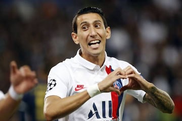 Angel di María celebrates after scoring against his former club as PSG beat Real Madrid 3-0 in Paris on Wednesday night.