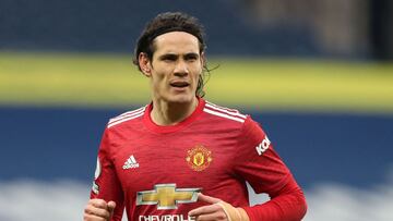 (FILES) In this file photo taken on February 14, 2021 Manchester United's Uruguayan striker Edinson Cavani plays during the English Premier League football match between West Bromwich Albion and Manchester United at The Hawthorns stadium in West Bromwich, central England. - Manchester United manager Ole Gunnar Solskjaer said it "doesn't make sense" for his players to travel for international duty later this month if they have to quarantine on their return and miss games as a result. Arrivals in Britain from "Red List" countries are subject to 10 days' hotel confinement. South American countries and Portugal are among the nations on that list meaning United stars Bruno Fernandes of Portugal and Uruguayan striker Edinson Cavani could be missing for World Cup qualifiers. Liverpool manager Jurgen Klopp said his club will also withdraw players if they are forced to quarantine, casting the participation of Brazilian trio Alisson Becker, Roberto Firmino and Fabinho and Portugal forward Diogo Jota into doubt. (Photo by Naomi Baker / POOL / AFP) / RESTRICTED TO EDITORIAL USE. No use with unauthorized audio, video, data, fixture lists, club/league logos or 'live' services. Online in-match use limited to 120 images. An additional 40 images may be used in extra time. No video emulation. Social media in-match use limited to 120 images. An additional 40 images may be used in extra time. No use in betting publications, games or single club/league/player publications. /