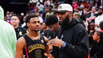 HOUSTON, TEXAS - MARCH 28: Bronny James #6 of the West team talks to Lebron James of the Los Angeles Lakers after the 2023 McDonald's High School Boys All-American Game at Toyota Center on March 28, 2023 in Houston, Texas.   Alex Bierens de Haan/Getty Images/AFP (Photo by Alex Bierens de Haan / GETTY IMAGES NORTH AMERICA / Getty Images via AFP)