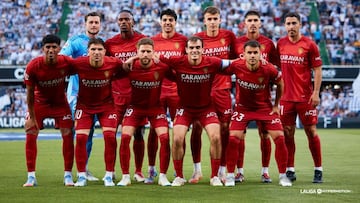 El once del Real Zaragoza: Joan Femanías, Jair, Clemente, Bazdar, Vital y Toni Moya en la fila de arriba y Ares, Raúl Guti, Calero, Francho y Aketxe en la de abajo.