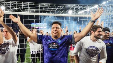 Valladolid owner Ronaldo celebrates with fans but his plans for the club crest have not been well received.