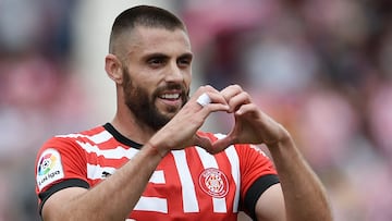 Girona's Spanish midfielder David Lopez celebrates scoring the equalizing goal during the Spanish league football match between Girona FC and Villarreal CF at the Montilivi stadium in Girona on May 20, 2023. (Photo by Josep LAGO / AFP)