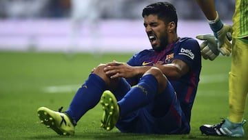 Suárez out with knee injury, Piqué doubtful for Betis match