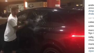 Andrea Iannone, destrozando su Porsche Cayenne.