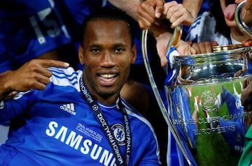 Didier Drogba celebrates winning the Champions League with Chelsea in 2012.