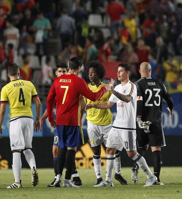 Morata and James shake hands after the game.