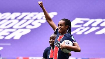 Paris Saint-Germainx92s French forward Marie-Antoinette Katoto (R) and Paris Saint-Germainx92s French forward Oceane Hurtre (L) celebrate after Lyonx92s French defender Wendie Renard scored an own goal during the UEFA Womenx92s Champions League quarter fi