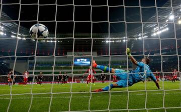 Kevin Gameiro of Atletico scores the 3rd goal by penalty kick during the UEFA Champions League match between Atletico and Bayer