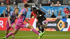 Jul 30, 2023; Toronto, Ontario, CAN; Atlas forward Jordy Caicedo (23) shoots the ball passed Toronto FC defender Lazer Stefanovic (76) to score a goal in the first half at BMO Field. Mandatory Credit: Dan Hamilton-USA TODAY Sports