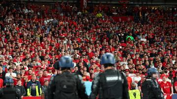 PARIS, FRANCE - MAY 28: Police and stwards watching Liverpool fans during the UEFA Champions League final match between Liverpool FC and Real Madrid at Stade de France on May 28, 2022 in Paris, France. (Photo by Robbie Jay Barratt - AMA/Getty Images)