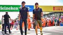 Red Bull Racing's Dutch driver Max Verstappen (CL) and Red Bull Racing's Mexican driver Sergio Perez (CR) walk prior to the Italian Formula One Grand Prix race at Autodromo Nazionale Monza circuit, in Monza on September 3, 2023. (Photo by Ben Stansall / AFP)