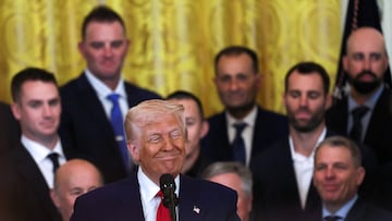 U.S. President Donald Trump reacts as he welcomes the members of the 2024 World Series Champion Los Angeles Dodgers in the East Room at the White House in Washington, D.C., U.S., April 7, 2025. REUTERS/Leah Millis