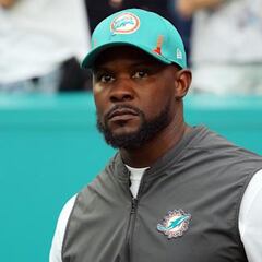 Did Brian Flores sign a separation agreement with the Miami Dolphins?