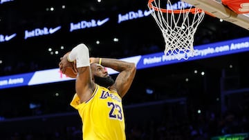 LOS ANGELES, CALIFORNIA - APRIL 30: LeBron James #23 of the Los Angeles Lakers dunks the ball against the Minnesota Timberwolves during the second quarter in Game Five of the Western Conference First Round NBA Playoffs at Crypto.com Arena on April 30, 2025 in Los Angeles, California. NOTE TO USER: User expressly acknowledges and agrees that, by downloading and or using this photograph, User is consenting to the terms and conditions of the Getty Images License Agreement. Harry How/Getty Images/AFP (Photo by Harry How / GETTY IMAGES NORTH AMERICA / Getty Images via AFP)
