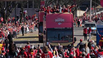 Feb 14, 2024; Kansas City, MO, USA; Kansas City Chiefs owner Clark Hunt and wife Tavia Hunt and coach Andy Reid ride on a bus during the celebration of the Chiefs winning Super Bowl LVIII. Mandatory Credit: Kirby Lee-USA TODAY Sports