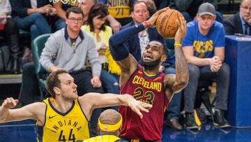 Apr 22, 2018; Indianapolis, IN, USA; Cleveland Cavaliers forward LeBron James (23) shoots the ball while Indiana Pacers forward Bojan Bogdanovic (44) defends in the second half of game four in the first round of the 2018 NBA Playoffs at Bankers Life Field