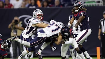 Aug 19, 2017; Houston, TX, USA; New England Patriots running back D.J. Foster (27) runs over Houston Texans cornerback Malik Smith (36) and scores a touchdown during the second half at NRG Stadium. Mandatory Credit: Kevin Jairaj-USA TODAY Sports