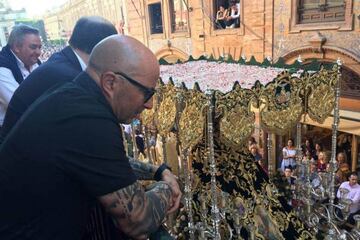 Jorge Sampaoli watches the Macarena pass by in Seville's Easter processions
