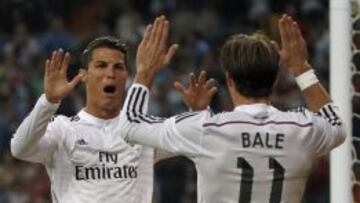Cristiano celebra uno de sus goles con Bale.