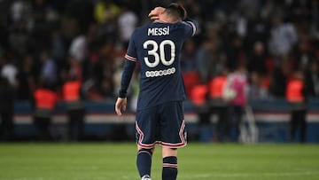 Paris Saint-Germain's Argentinian forward Lionel Messi reacts at the end of the French L1 football match between Paris-Saint Germain (PSG) and ES Troyes AC at The Parc des Princes Stadium in Paris on May 8, 2022. - The match ended 2-2. (Photo by Anne-Christine POUJOULAT / AFP) (Photo by ANNE-CHRISTINE POUJOULAT/AFP via Getty Images)