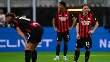 AC Milan Croatian midfielder #14 Luka Modri? (R) reacts during the Italian Serie A football match between AC Milan and Udinese at the San Siro stadium in Milan, northern Italy, on April 11, 2026. (Photo by MARCO BERTORELLO / AFP)