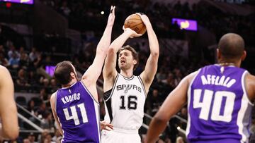 Mar 8, 2017; San Antonio, TX, USA; San Antonio Spurs center Pau Gasol (16) shoots the ball over Sacramento Kings center Kosta Koufos (41) during the first half at AT&T Center. Mandatory Credit: Soobum Im-USA TODAY Sports