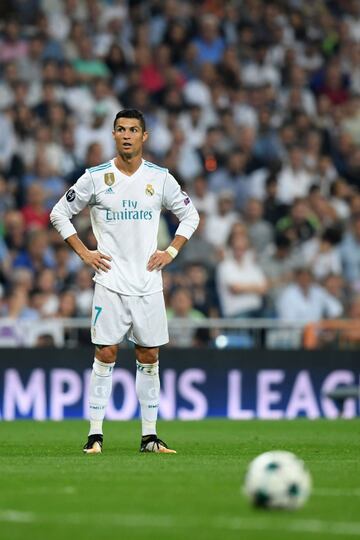 Real Madrid's forward from Portugal Cristiano Ronaldo looks on during the UEFA Champions League football match Real Madrid CF vs APOEL FC at the Santiago Bernabeu stadium 