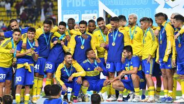 Argentina's Boca Juniors celebrate their victory following a friendly football match between Spain's Barcelona and Argentina's Boca Juniors part of the Maradona Cup at the Mrsool Park Stadium in the Saudi capital Riyadh on December 14, 2021. (Photo by AFP)