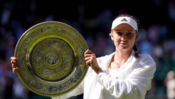 Elena Rybakina celebrates with the The Venus Rosewater Dish following victory over Ons Jabeur in The Final of the Ladies' Singles on day thirteen of the 2022 Wimbledon Championships at the All England Lawn Tennis and Croquet Club, Wimbledon. Picture date: Saturday July 9, 2022. (Photo by Zac Goodwin/PA Images via Getty Images)