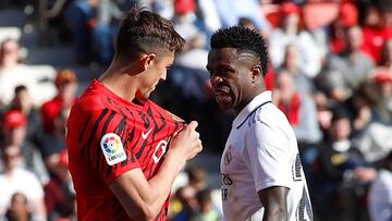 Mallorca's Spanish defender Antonio Jose Raillo (L) argues with Real Madrid's Brazilian forward Vinicius Junior during the Spanish League football match between RCD Mallorca and Real Madrid at the Visit Mallorca stadium in Palma de Mallorca on February 5, 2023. (Photo by JAIME REINA / AFP) (Photo by JAIME REINA/AFP via Getty Images)