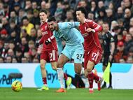 Soccer Football - Premier League - Liverpool v Burnley - Anfield, Liverpool, Britain - January 17, 2026 Burnley's Armando Broja in action with Liverpool's Curtis Jones REUTERS/Peter Powell EDITORIAL USE ONLY. NO USE WITH UNAUTHORIZED AUDIO, VIDEO, DATA, FIXTURE LISTS, CLUB/LEAGUE LOGOS OR 'LIVE' SERVICES. ONLINE IN-MATCH USE LIMITED TO 120 IMAGES, NO VIDEO EMULATION. NO USE IN BETTING, GAMES OR SINGLE CLUB/LEAGUE/PLAYER PUBLICATIONS. PLEASE CONTACT YOUR ACCOUNT REPRESENTATIVE FOR FURTHER DETAILS..