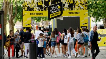 Cycling - Tour de France - Preview - Bilbao, Spain - June 28, 2023 People walk past the fan park ahead of the Tour de France REUTERS/Vincent West