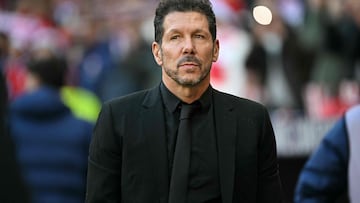 Atletico Madrid's Argentine coach Diego Simeone looks on prior the Spanish league football match between Club Atletico de Madrid and Valencia CF at Metropolitano Stadium in Madrid on December 13, 2025. (Photo by Javier SORIANO / AFP)