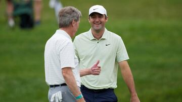 Augusta National Golf Club Chairman Fred Ridley (L) and Scottie Scheffler of the United States meet on the 14th green during the Pro-Am event prior to the Memorial Tournament presented by Workday at Muirfield Village Golf Club on June 05, 2024, in Dublin, Ohio.